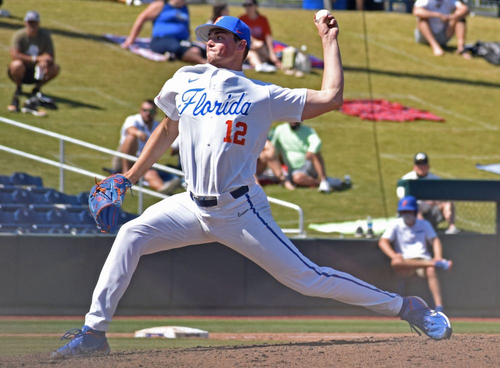 <p>Hunter Barco delivers a pitch during the matchup with Jacksonville, March 14, 2021. </p>