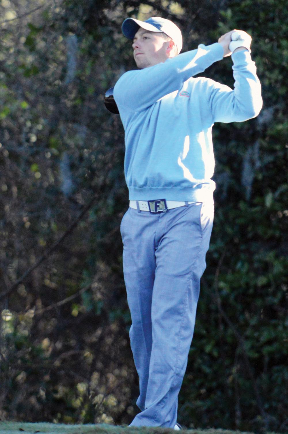 <p>J.D. Tomlinson tees off during Day 2 of the SunTrust Gator Invitational on Feb. 16 at the Mark Bostick Golf Course.</p>