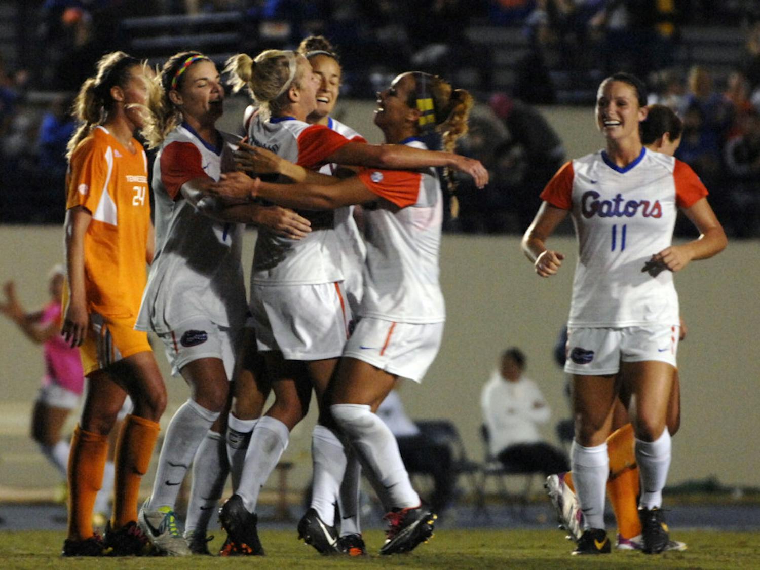 Players celebrate Tessa Andujar's goal during Florida's 3-1 win against Tennessee on Friday at James G. Pressly Stadium.