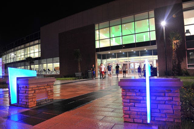 Students exit UF&#x27;s Southwest Rec Center on a Sunday night.