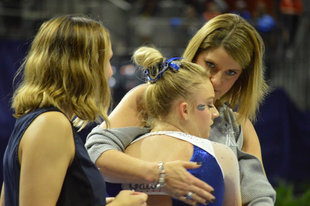 Gymnastics coach Jenny Rowland  praised her team’s mental fortitude Friday night.“They continued to fight all the way through to the very last performance as it was tight all the way up until that very last dismount.”