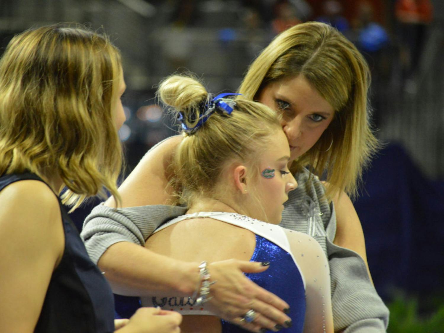 Gymnastics coach Jenny Rowland  praised her team’s mental fortitude Friday night.“They continued to fight all the way through to the very last performance as it was tight all the way up until that very last dismount.”