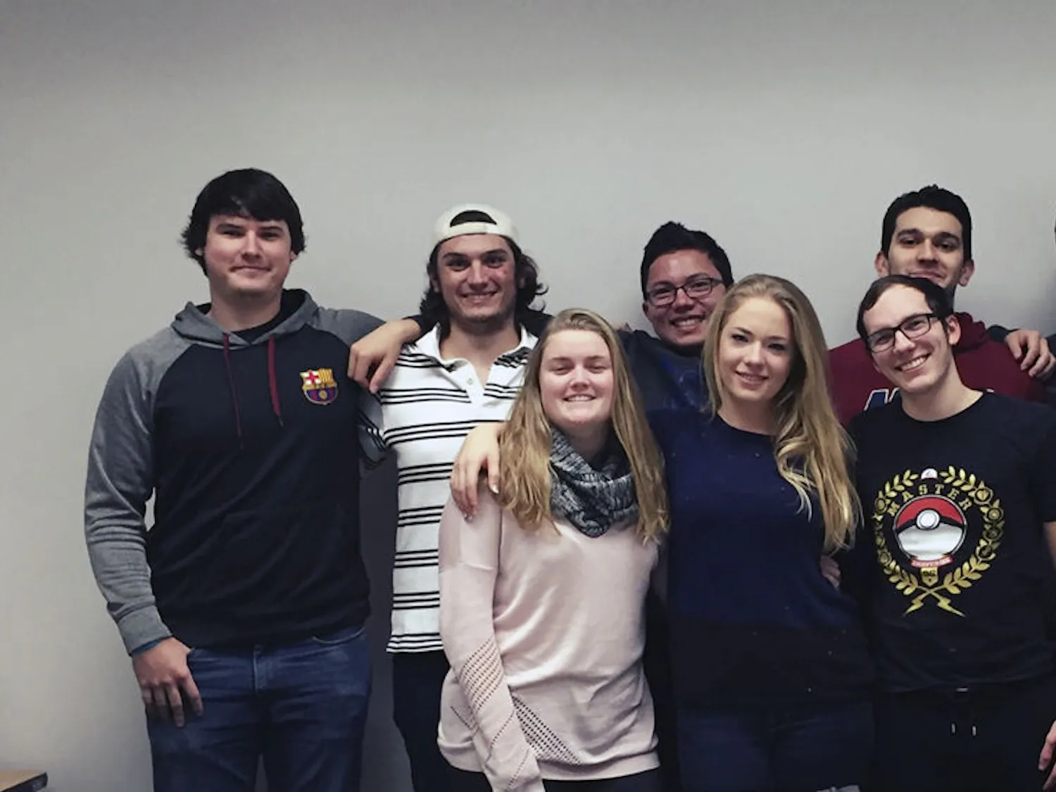 From left, clockwise, University of Florida Odyssey of the Mind team members Raymond Salzmann, John Michael Timmel, Niell Shikada, Shandy Sulen, Camilo Gonzalez, Brian Hayes Emily Long and Samantha Patten, pose for a photo. Odyssey of the Mind is a competition that tasks participants with coming up with creative solutions to a variety of problems before presenting them at local, state and world-level competitions.