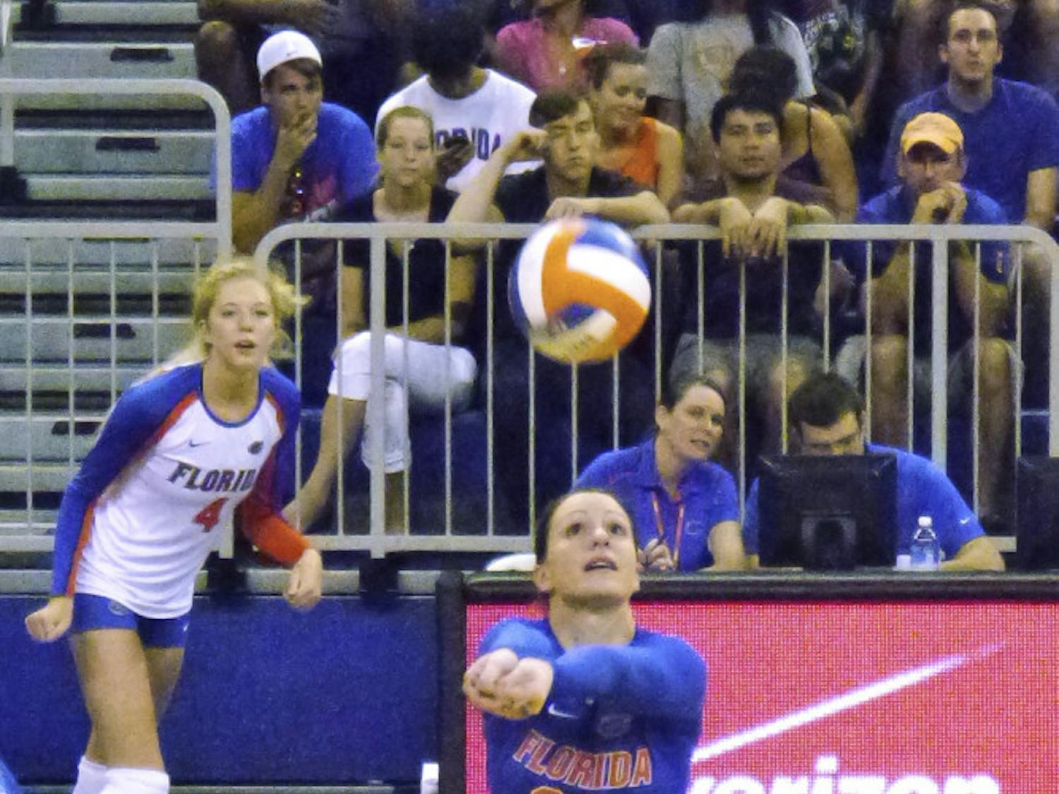 Holly Pole digs the ball during Florida's 3-1 loss to Texas on Saturday Sept. 6, in the O'Connell Center
