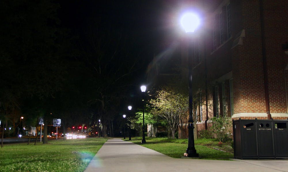 UF Facility Services is updating 500 campus lights with energy-efficient LED bulbs to increase campus safety.