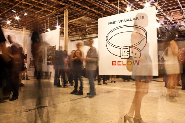 Visitors enjoy the opening of the MASS Visual Arts semi-annual art show at the Top Secret Space on Saturday. The exhibit showcases artwork presenting interpretations of the theme, “Below the Belt.” It will be open weekends, Saturdays from 5 p.m. to 10 p.m. and Sundays noon to 6 p.m., until the closing reception on Friday, March 30. For more information, visit www.massvisualarts.org.