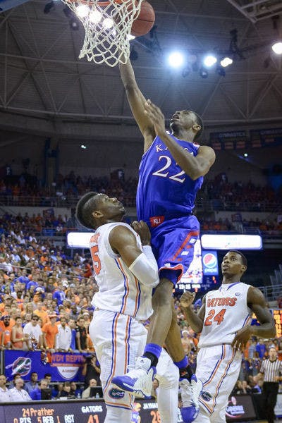 Kansas guard Andrew Wiggins (22) attempts a layup during No. 19 Florida's 67-61 win against No. 13 Kansas on Tuesday night in the O'Connell Center.