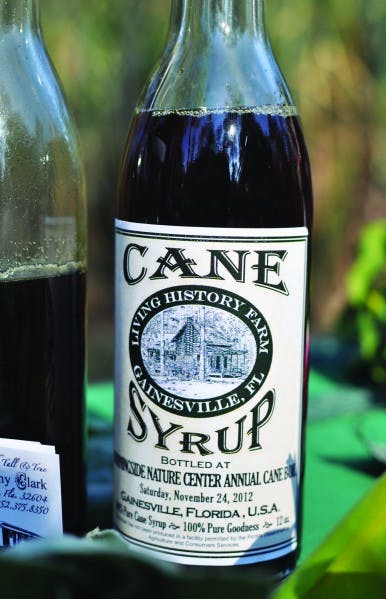 Cane syrup is produced after harvesting and pressing sugarcane into juice. The juice is then boiled into a syrup, which was sold to patrons.