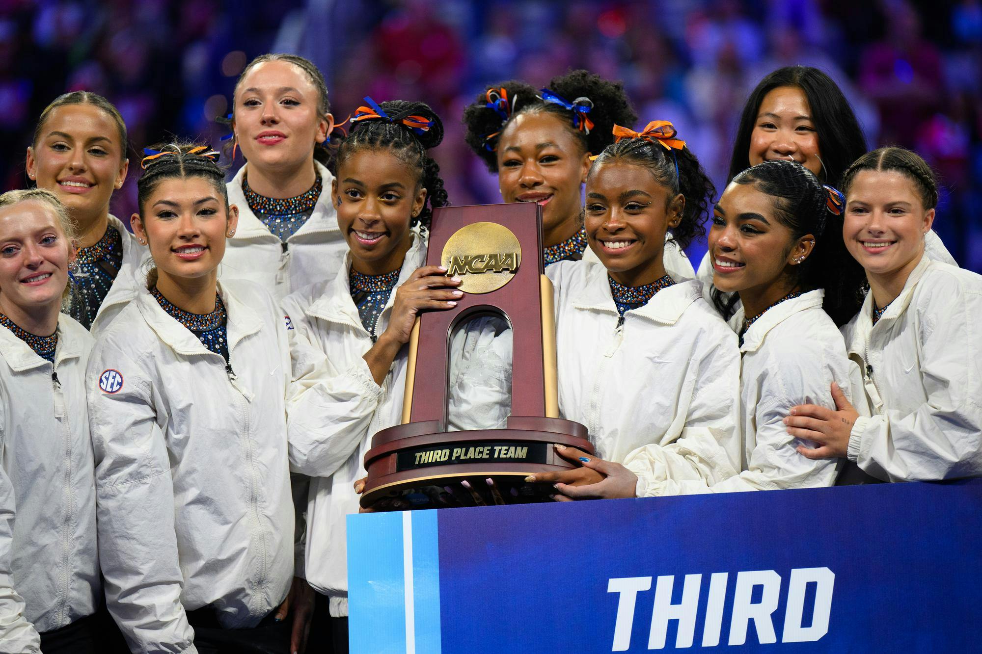 The Gators hold their third place trophy after the NCAA gymnastics National Championship against Oklahoma, LSU and Minnesota, Saturday, April 18, 2026, in Fort Worth, Texas.