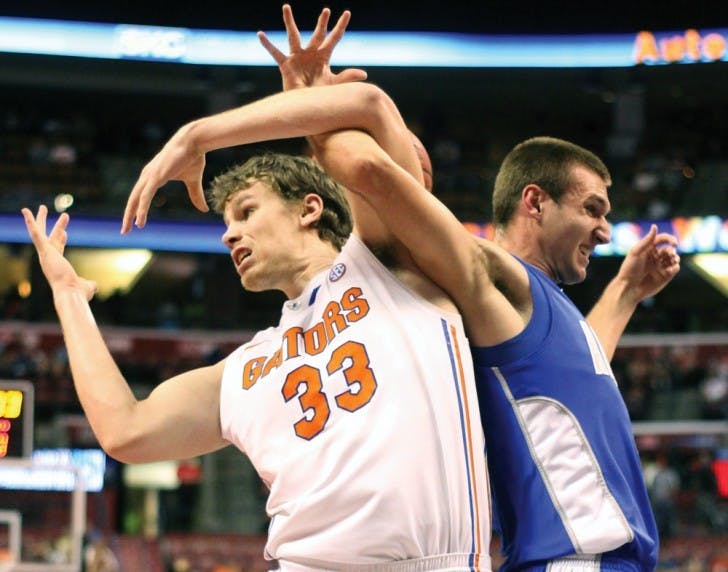 Forward Erik Murphy battles for the ball against during Florida’s 78-61 win against Air Force on Dec. 29 in the BB&amp;T Center in Sunrise.