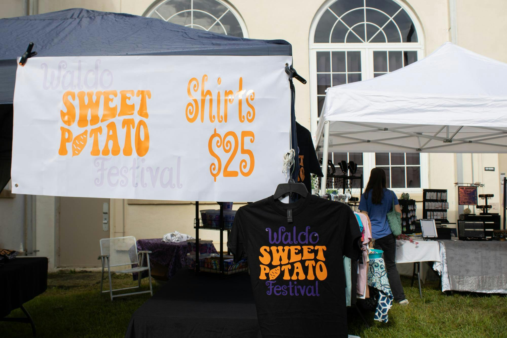 Themed shirts for sale at the 2nd Annual Waldo Sweet Potato Festival, Saturday, Sept. 12, 2026, in Waldo, Fla.