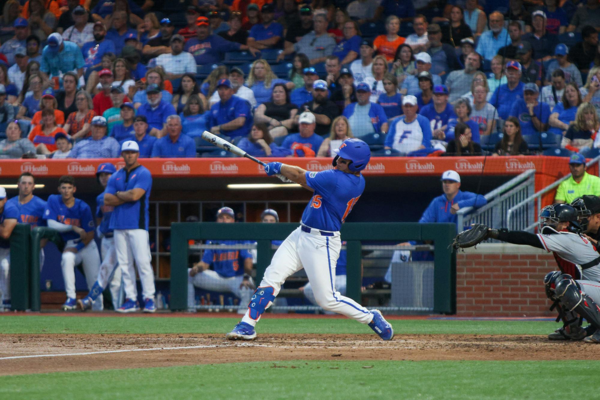 Florida catcher BT Riopelle swings his bat during the Gators' 2-1 win against the Georgia Bulldogs Saturday, April 15, 2023.