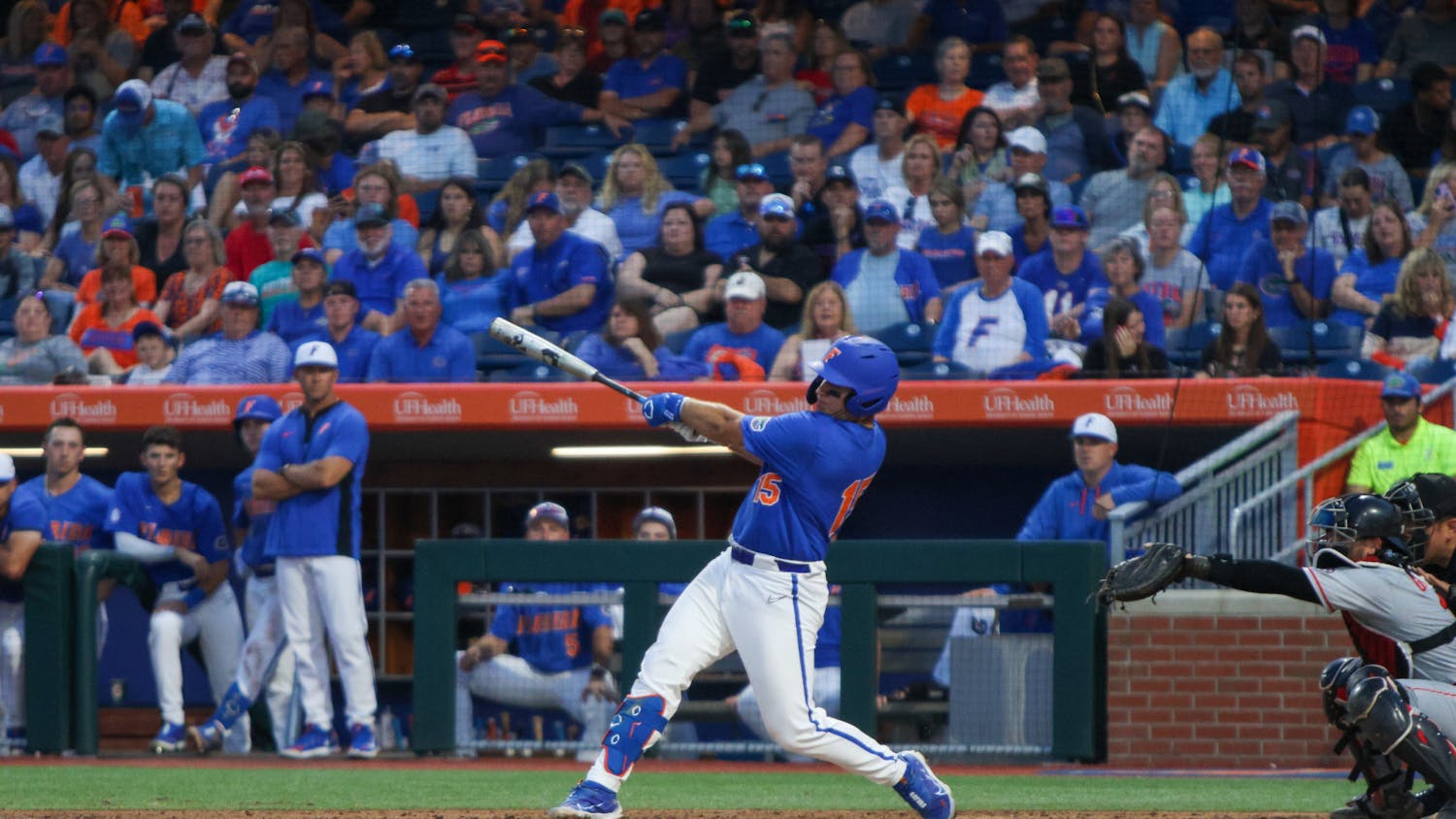 Florida catcher BT Riopelle swings his bat during the Gators' 2-1 win against the Georgia Bulldogs Saturday, April 15, 2023.