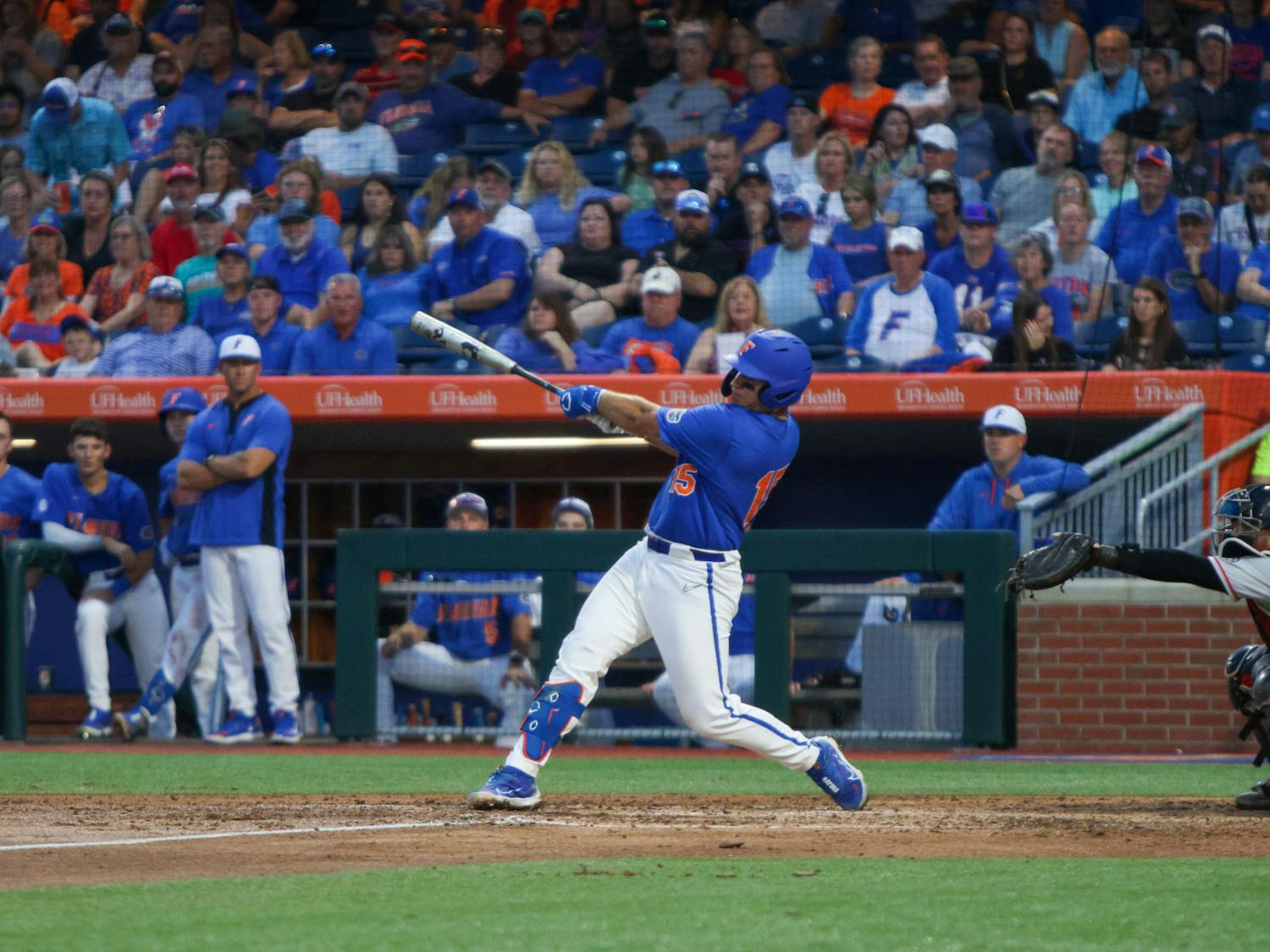 Florida catcher BT Riopelle swings his bat during the Gators' 2-1 win against the Georgia Bulldogs Saturday, April 15, 2023.