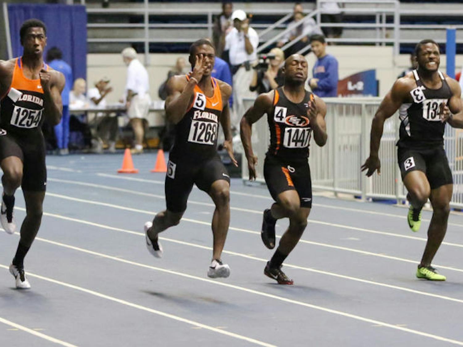 Sophomore Marquis Dendy (far left) races in the 55m on Jan. 17 during the Gator Invitational in the O’Connell Center. Dendy is set to compete in the long jump on Saturday.