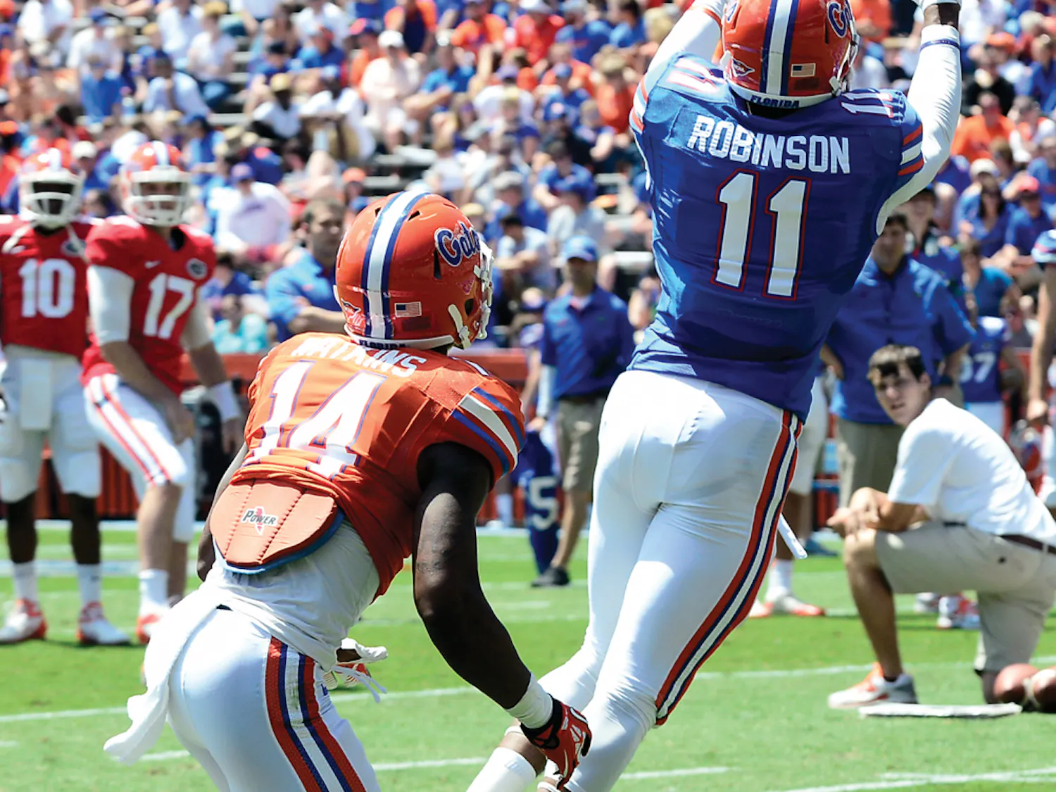 Wide receiver Demarcus Robinson catches a pass at the Orange and Blue Debut in Ben Hill Griffin Stadium on April 6, 2013.