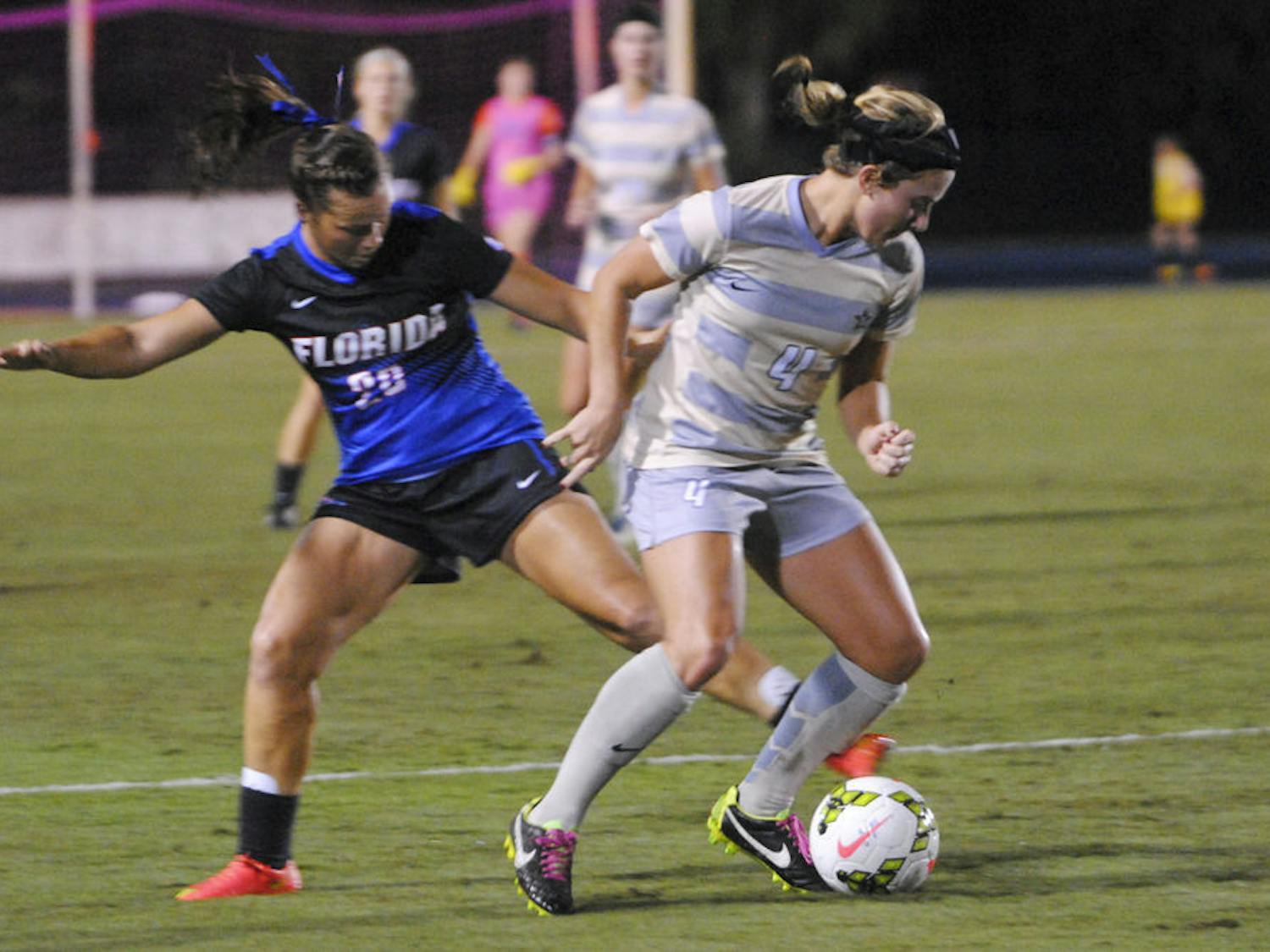 Meggie Dougherty Howard attempts to get the ball from a Vanderbilt player during UF's 6-1 win on Thursday.