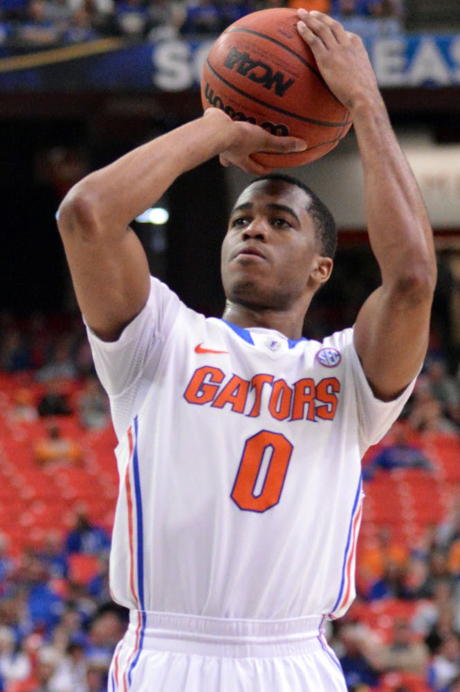 Kasey Hill attempts a free throw during Florida's 56-49 win against Tennessee on Saturday in the Georgia Dome. Hill scored all five of the Gators' points off the bench against the Volunteers.
