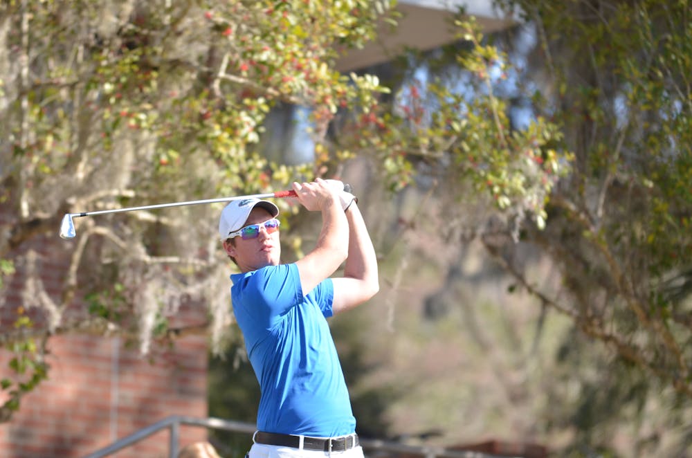 <p>Sam Horsfield completes his follow-through during round two of the SunTrust Gator Invitational on Feb. 21, 2016 at the Mark Bostick Golf Course.</p>