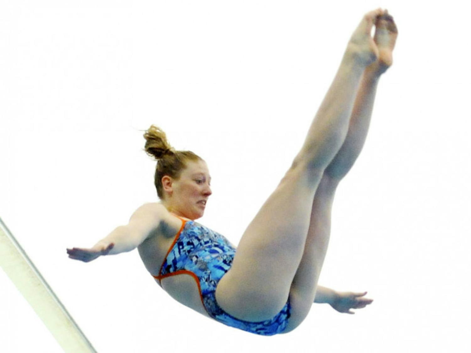 Khalia Warner dives during Florida’s meet against Auburn on Jan. 23, 2016, in the O’Connell Center.