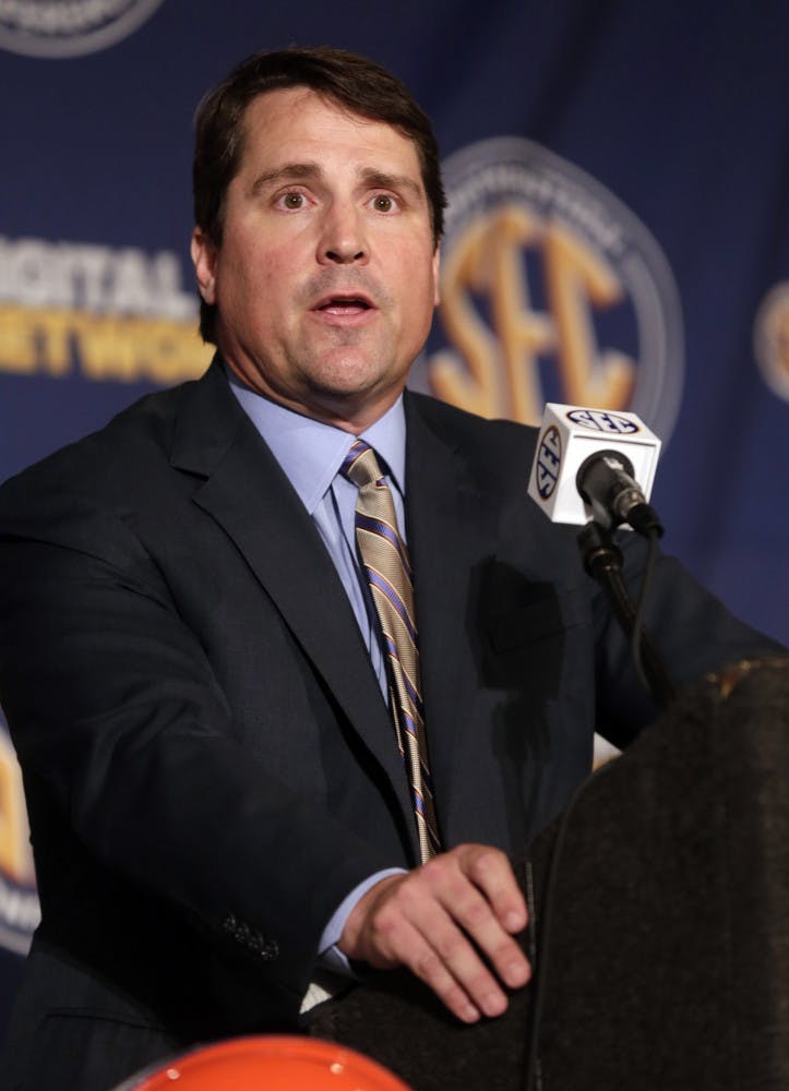 Florida coach Will Muschamp talks with reporters during the Southeastern Conference football Media Days in Hoover, Ala., on July 16, 2013. Muschamp held a football camp over the weekend for potential recruits. 