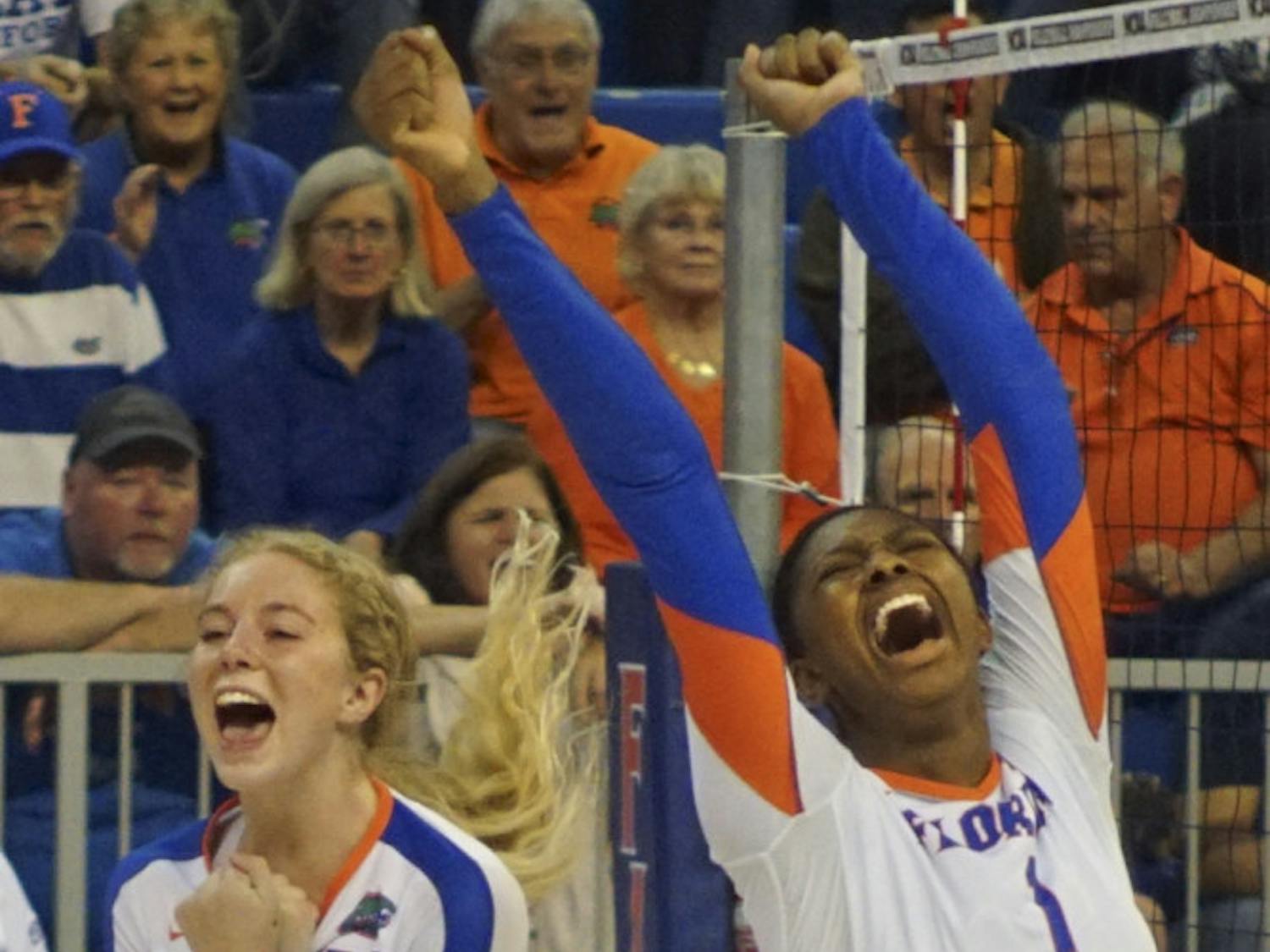 UF's Carli Snyder (left) and Rhamat Alhassan celebrate during Florida's 3-0 win against New Hampshire Dec. 3, 2015, in the O'Connell Center.