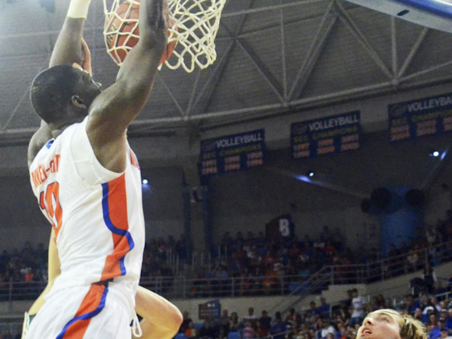 Dorian Finney-Smith dunks during Florida's win against William & Mary on Friday in the O'Connell Center