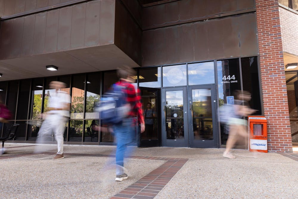 Students are seen entering and exiting Marston Science Library on Wednesday, Oct. 8, 2025.