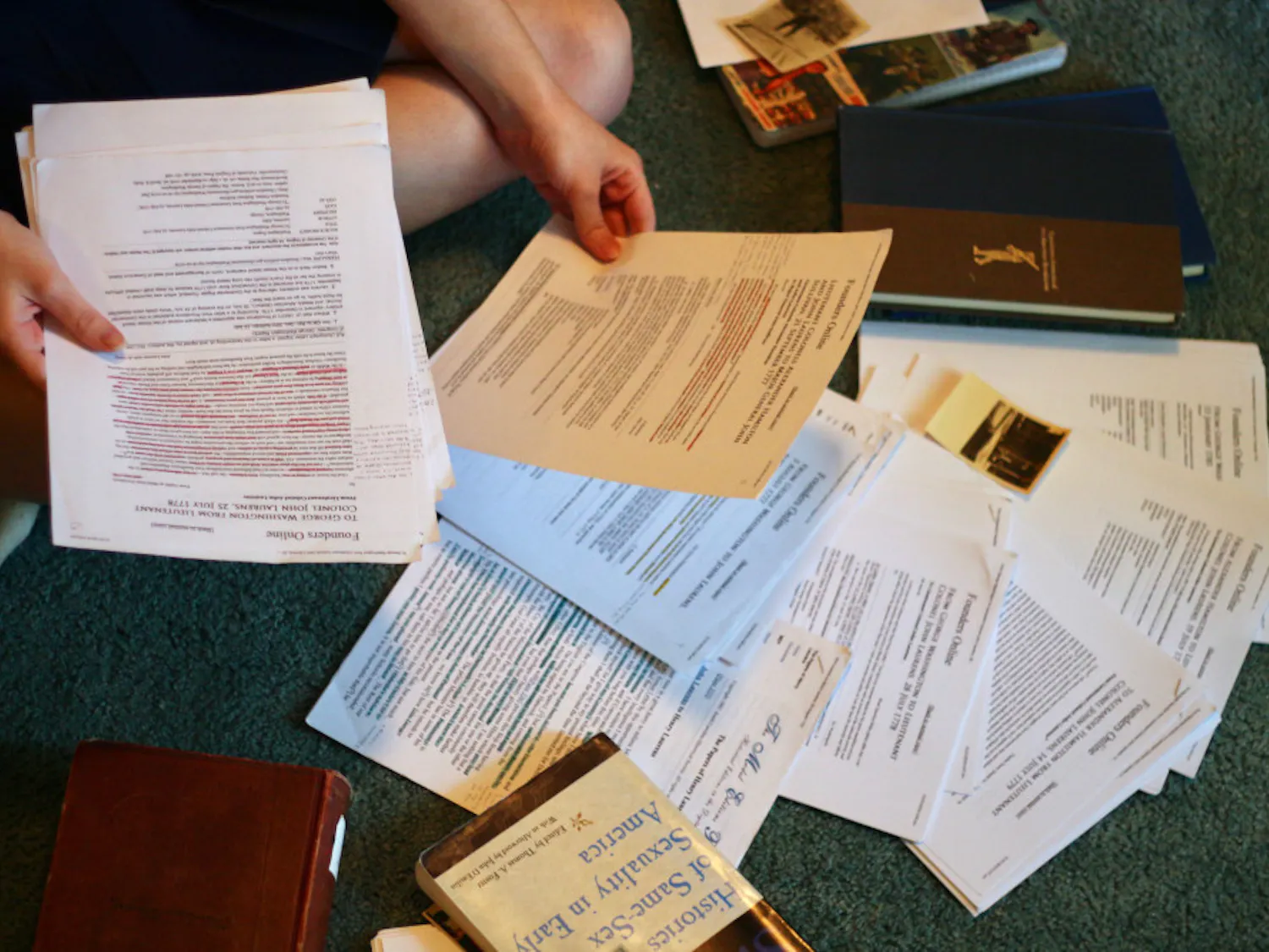 Caitlin Kantner looks through letters from John Laurens and other collected information, which she has gathered for her honors thesis.