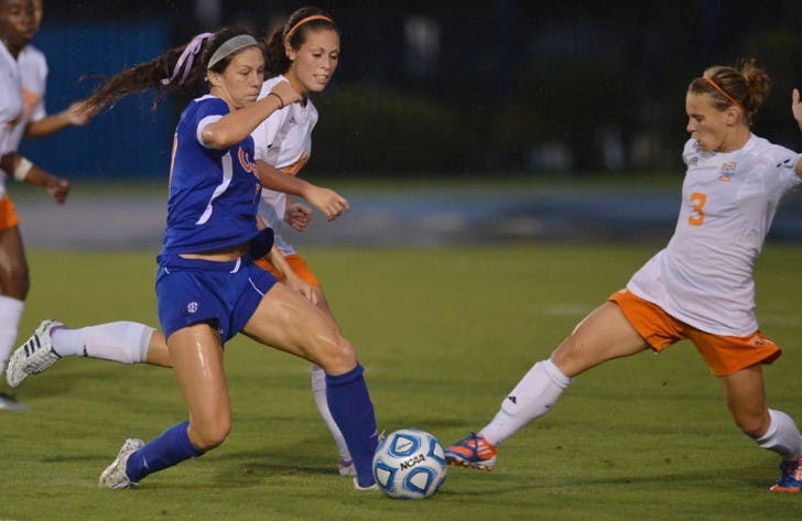 Senior midfielder Erika Tymrak dribbles past Tennessee junior Tori Balley (3) in Florida’s 2-1 win on Sept. 21 at James G. Pressly Stadium. Tymrak returned from a left ankle sprain on Friday.&nbsp;