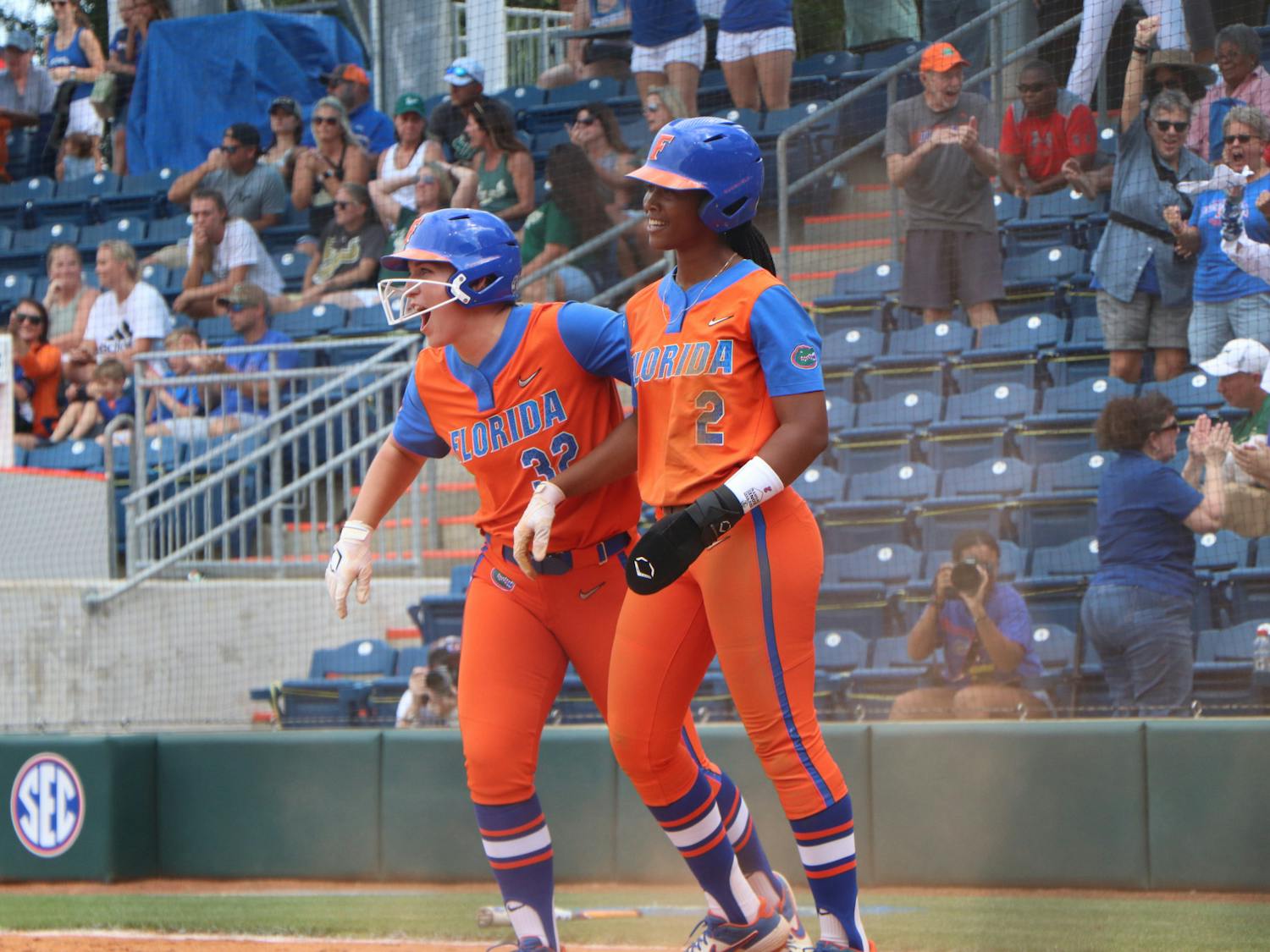 Florida's Kendyl Lindaman and Cheyenne Lindsey celebrate against South Florida on May 21. Lindaman and Lindsey combined for three hits and three RBIs in a 10-0 victory over South Alabama Saturday.