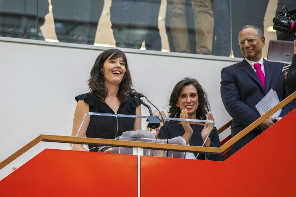New York Times staff writers Megan Twohey, left, and Jodi Kantor address colleagues in the newsroom in New York after the team they led won the 2018 Pulitzer Prize for Public Service on Monday, April 16, 2018. The Times shared the prize with Ronan Farrow of The New Yorker for their reporting on sexual harassment that ushered in a reckoning about the treatment of women by powerful men in the uppermost ranks of Hollywood, politics, media and technology. New York Times Executive Editor Dean Baquet looks on at right.&nbsp;