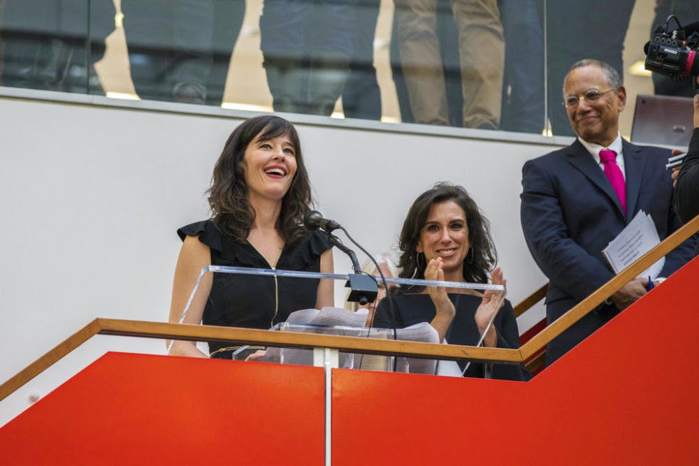 <p>New York Times staff writers Megan Twohey, left, and Jodi Kantor address colleagues in the newsroom in New York after the team they led won the 2018 Pulitzer Prize for Public Service on Monday, April 16, 2018. The Times shared the prize with Ronan Farrow of The New Yorker for their reporting on sexual harassment that ushered in a reckoning about the treatment of women by powerful men in the uppermost ranks of Hollywood, politics, media and technology. New York Times Executive Editor Dean Baquet looks on at right.&nbsp;</p>