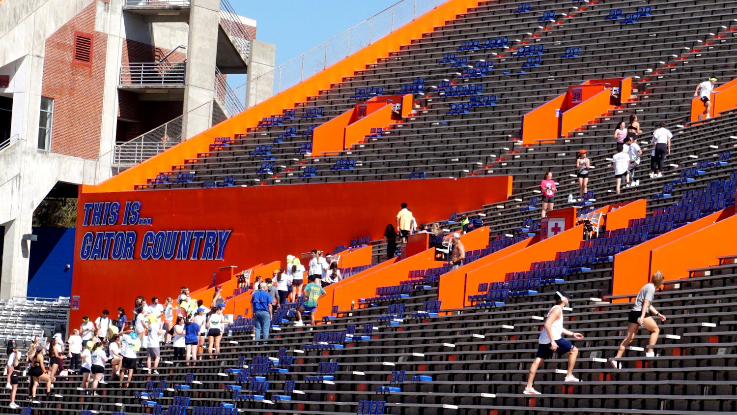 UF students climb up and down the stands of Ben Hill Griffin Stadium on the morning of Saturday, Feb. 26.