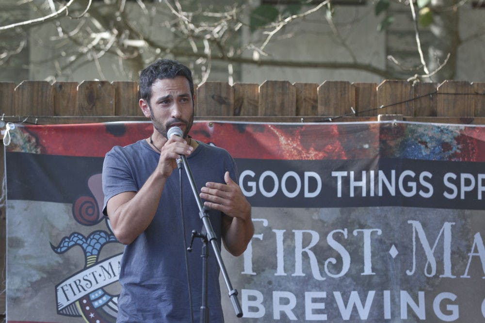 <p>Noah Shitama, 36-year-old founder of SwallowTail Farm, discusses the importance of supporting local farmers at the First Magnitude Brewing Company Sunday for the Back to the Garden CSA Fair. "We do it for the families that we feed and join us at the market," he said. "The community is the heart of it all," he said.</p>