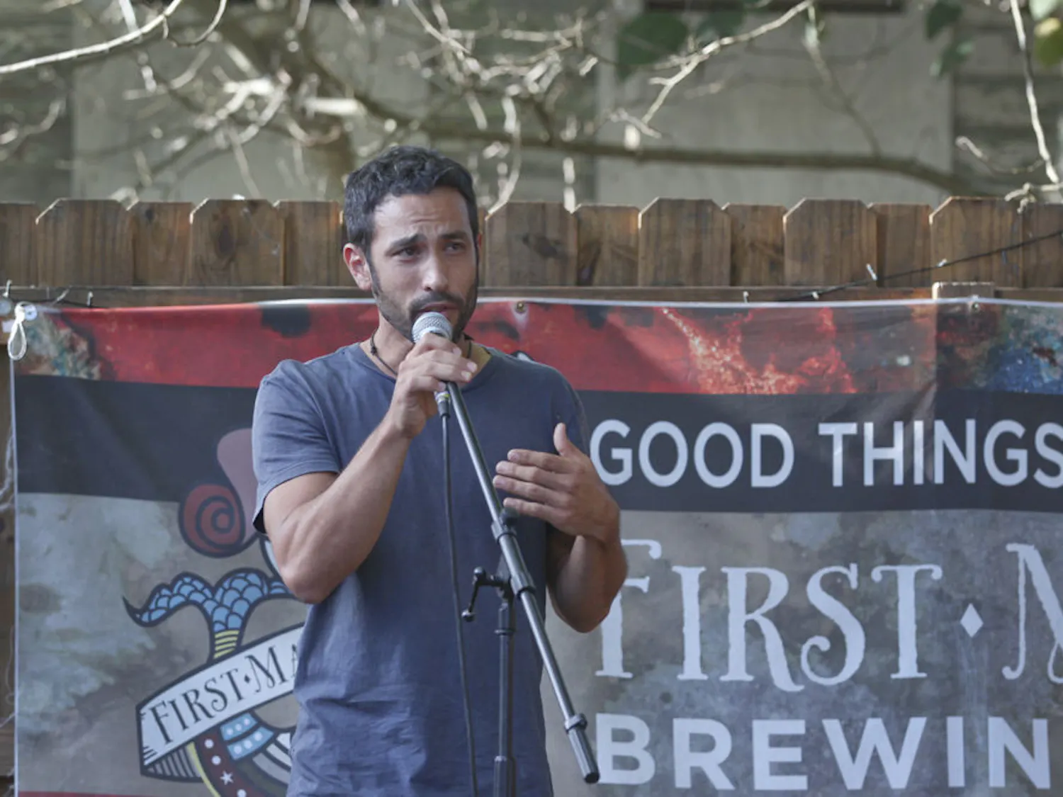 Noah Shitama, 36-year-old founder of SwallowTail Farm, discusses the importance of supporting local farmers at the First Magnitude Brewing Company Sunday for the Back to the Garden CSA Fair. "We do it for the families that we feed and join us at the market," he said. "The community is the heart of it all," he said.