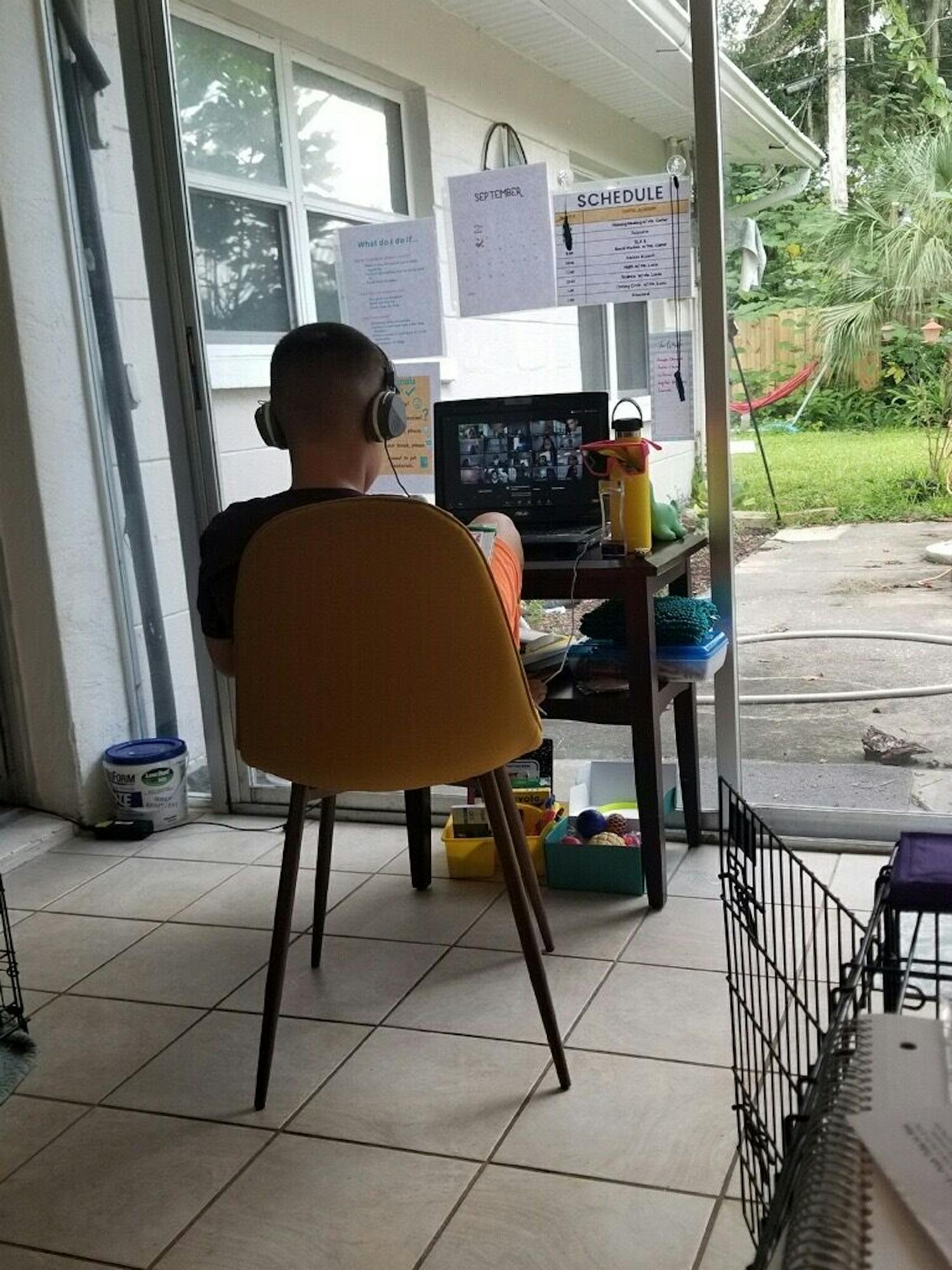 Aidan, 9, online sits in his learning set-up. His mom said he had a good first&nbsp;day.