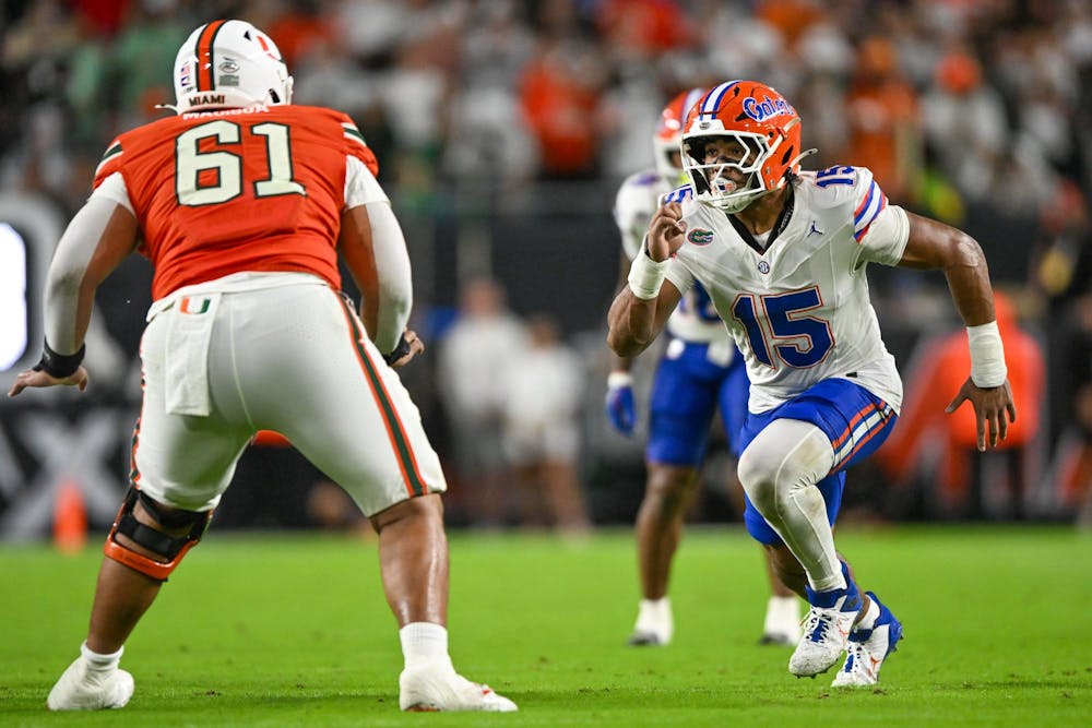 Florida Gators edge rusher Jayden Woods (15) during a football game between the Miami Hurricanes and the Florida Gators on Sept. 20, 2025, at Hard Rock Stadium in Miami Gardens, Fla.