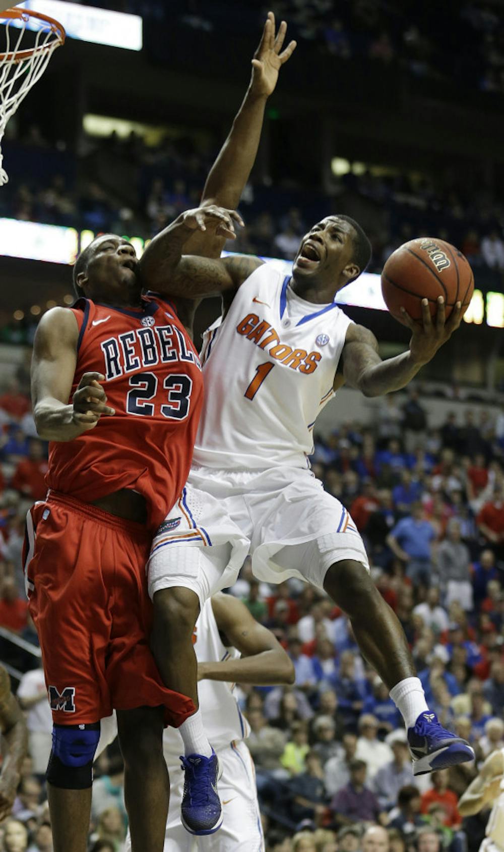 <p class="p1">Senior guard Kenny Boynton (1) takes it to the basket during Florida’s 66-63 loss to Ole Miss in the SEC Tournament final on March 17 at Bridgestone Arena in Nashville, Tenn. Boynton and the Gators have lost in the Elite Eight each of the last two years.</p>