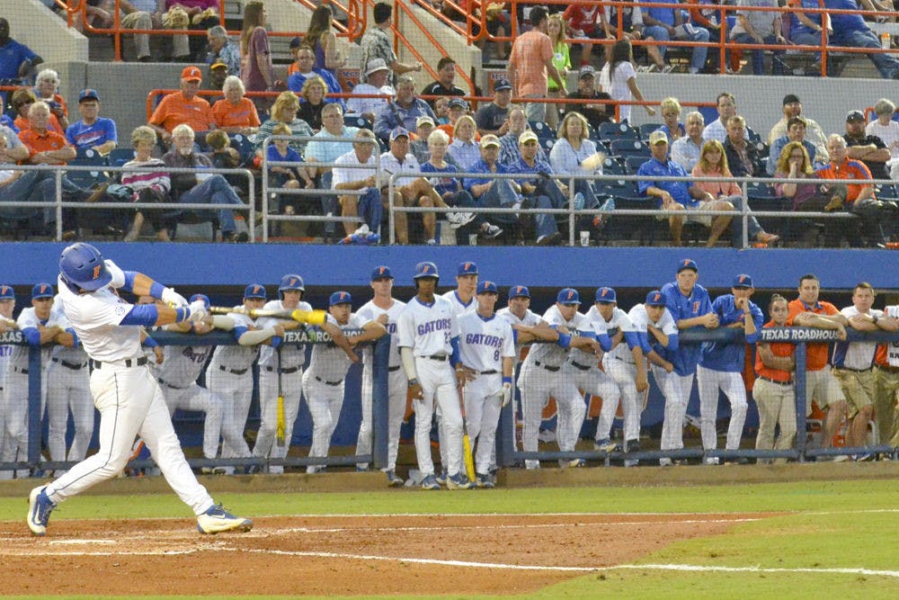 <p>Freshman infielder Jonathan India hits a ball during Florida's 7-4 win over Texas A&amp;M on April 1, 2016, at McKethan Stadium.</p>