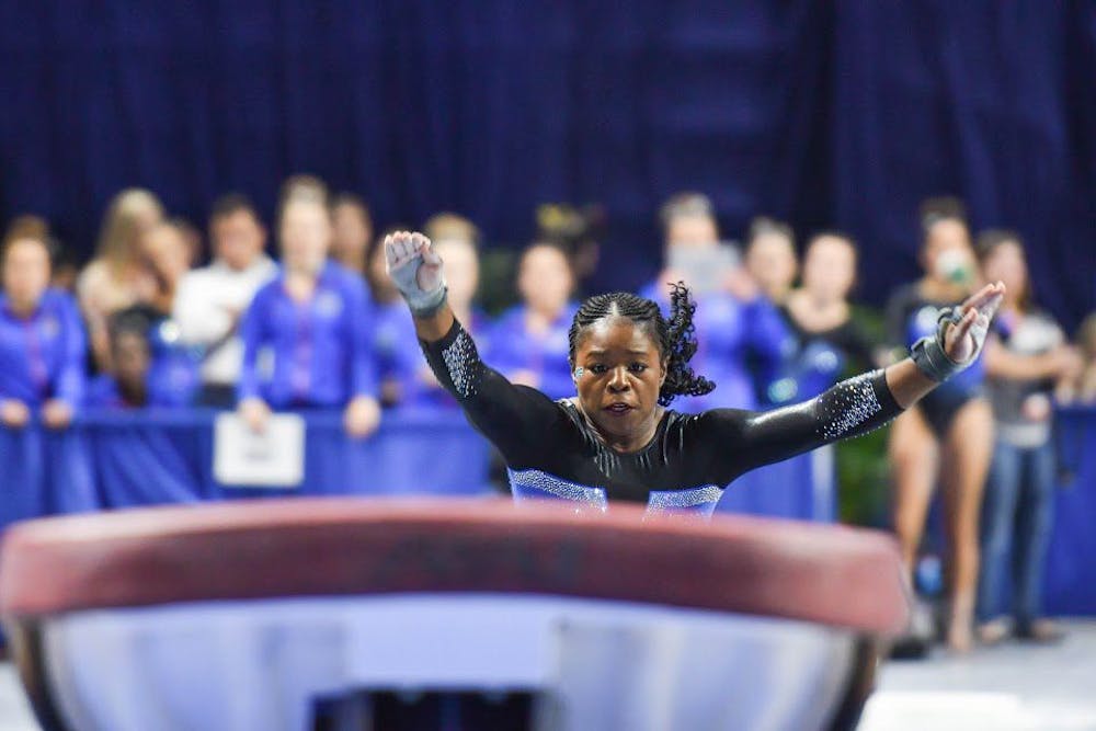 <p>UF gymnast Alicia Boren sprints during the NCAA Gainesville Regional on Sunday in the O'Connell Center.</p>