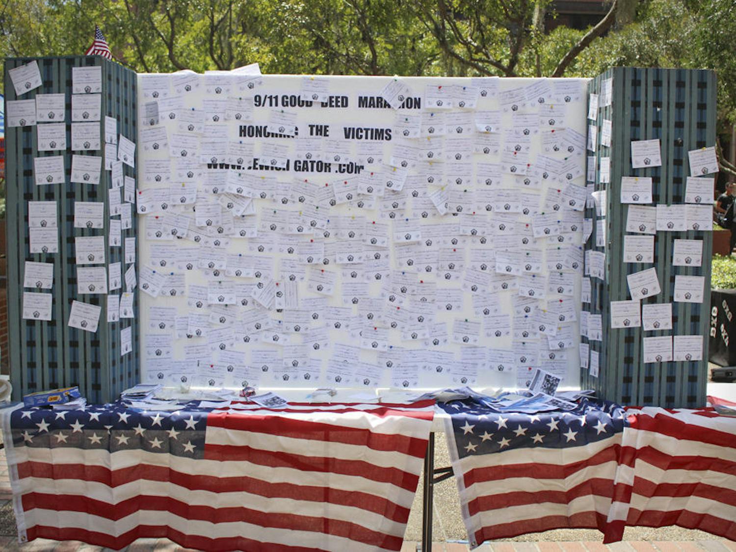 Lubavitch-Chabad Jewish Student Center and the Lubavitch-Chabad Student Group setup a memorial board and replica twin towers for the Sept. 11 victims in Turlington Plaza Friday. Representatives of the Center and club urged students to write down good deeds on slips of paper and attach them to the display.