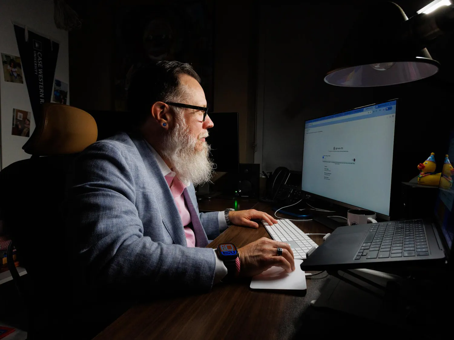 Brian Avery, the Senior Lecturer in the University of Florida Department of Sport Management, looks at his computer in his office, Thursday, April 9, 2026