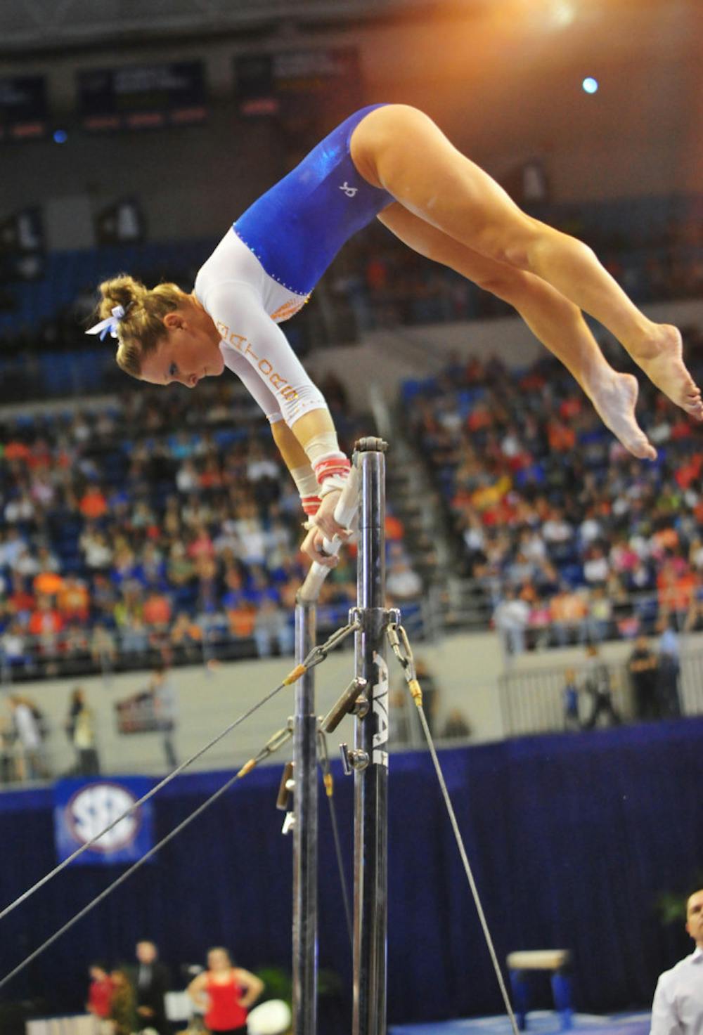 <p>Freshman Bridget Sloan performs her bar routine during Florida's 198.10-196.85 win against Alabama on Feb. 8 in the O'Connell Center. Sloan won the all-around title at the SEC Championship meet on Saturday.</p>