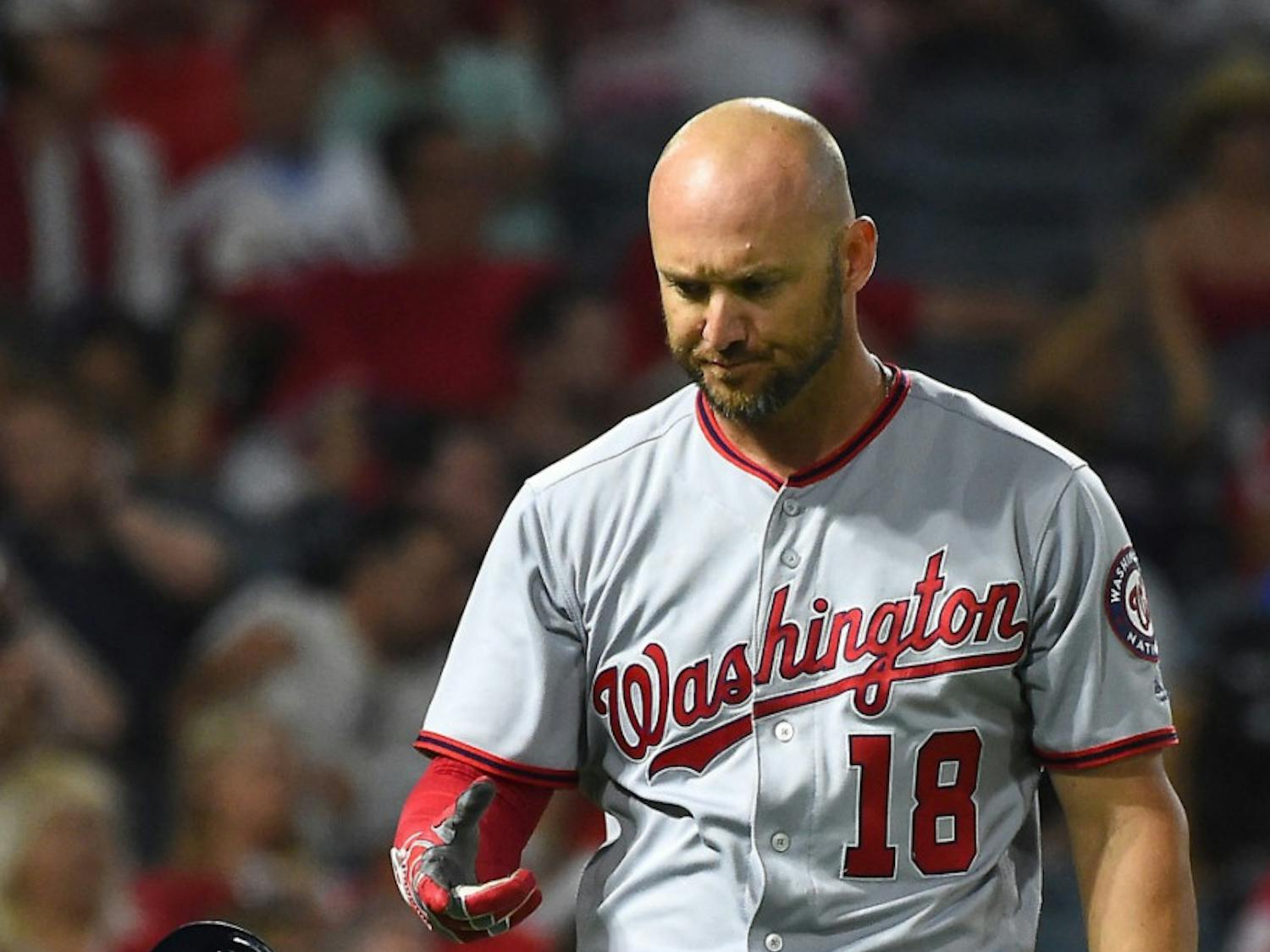 Ryan Raburn tosses his helmet during the sixth inning of Washington’s 7-0 loss against the Los Angeles Angels on July 19, 2017, at Angel Stadium.