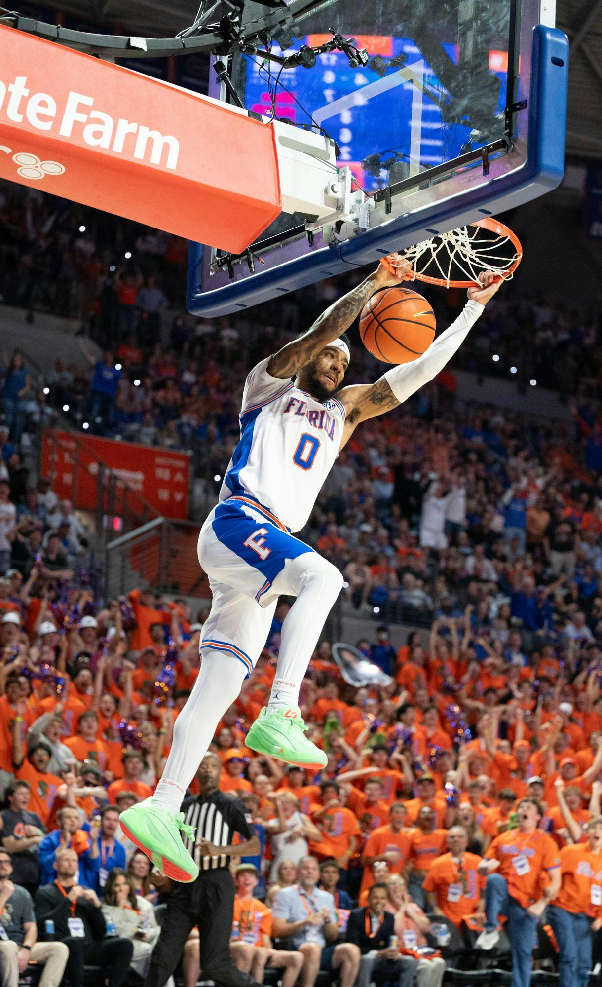 Florida guard Boogie Fland (0) dunks during the first half of an NCAA college basketball game against Kentucky, Saturday, Feb. 14, 2026 at Exactech Arena in Gainesville, Fla.