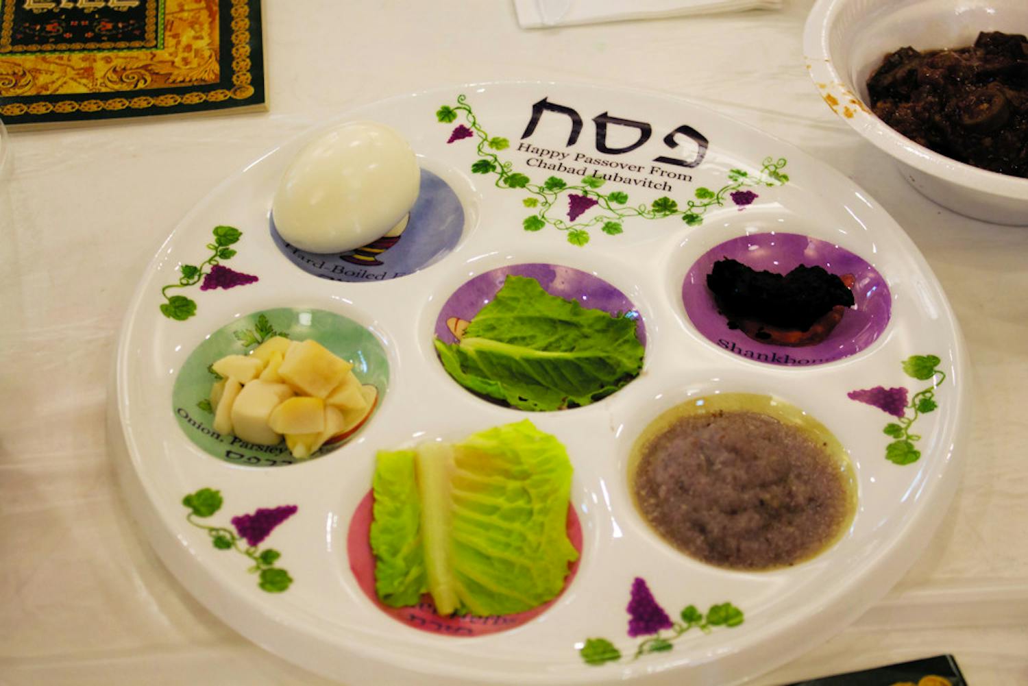 [FILE PHOTO] A seder sits on a table just before Passover begins. Each ingredient on the plate represents a different part of the story of how the Israelites were liberated from slavery in Egypt thousands of years ago, said Gabriel Ruiz, a UF Health Shands Hospital information technology analyst. 