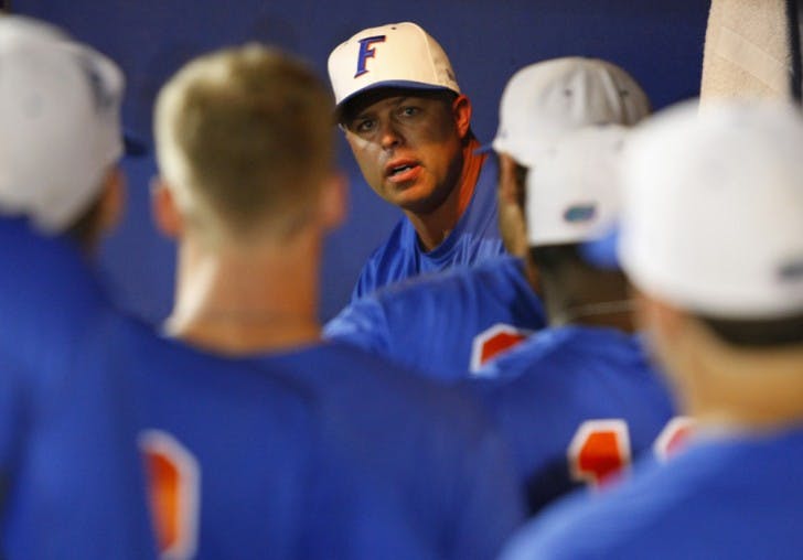 Coach Kevin O’Sullivan talks to his team following a loss to LSU in 2012. Texas A&amp;M knocked off O'Sullivan's Gators 6-3 in the first round of the SEC Tournament on Tuesday in Hoover, Ala.&nbsp;