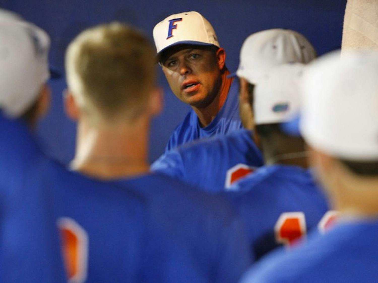 Coach Kevin O’Sullivan talks to his team following a loss to LSU in 2012. Texas A&M knocked off O'Sullivan's Gators 6-3 in the first round of the SEC Tournament on Tuesday in Hoover, Ala. 