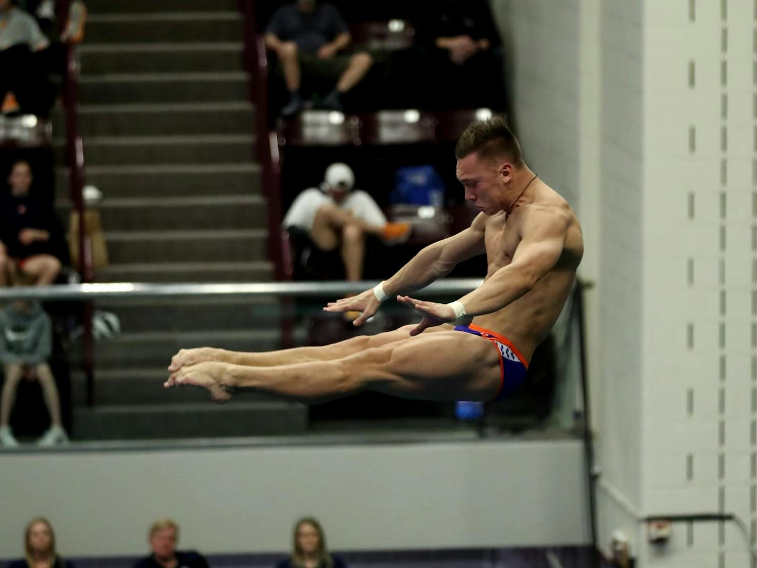 Senior Anton Sviskrkyi dives during the SEC Championship on Saturday, Feb. 18, 2023. 